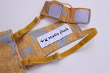 close up of velcro closure details on chicken diaper