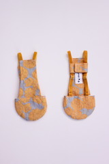 studio cluck chicken diaper in golden marigold print