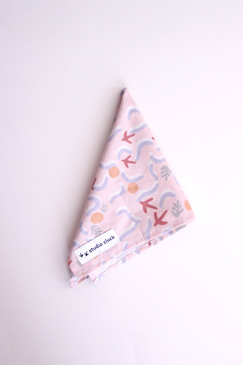 studio cluck bandana - cotton fabric with exclusive studio cluck early bird print - folded in quarters