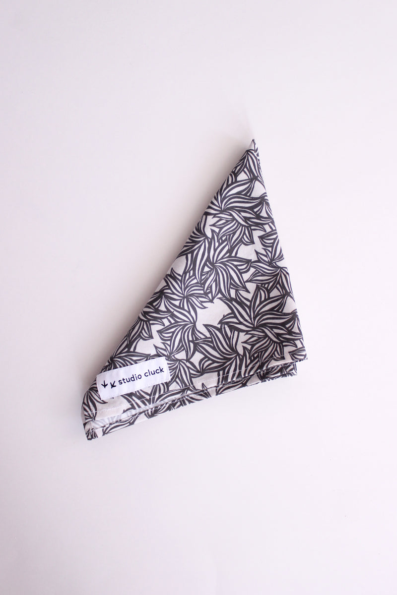 studio cluck bandana wild - cotton fabric with exclusive studio cluck wild print - folded in quarters - black and white graphic print leaves - inspired by hosta plants and zebra print