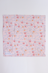 studio cluck early bird bandana - cotton fabric with exclusive studio cluck print pink background with chicken foot prints, worms, leaves, and golden orbs