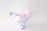 chicken wearing pink tutu and bow